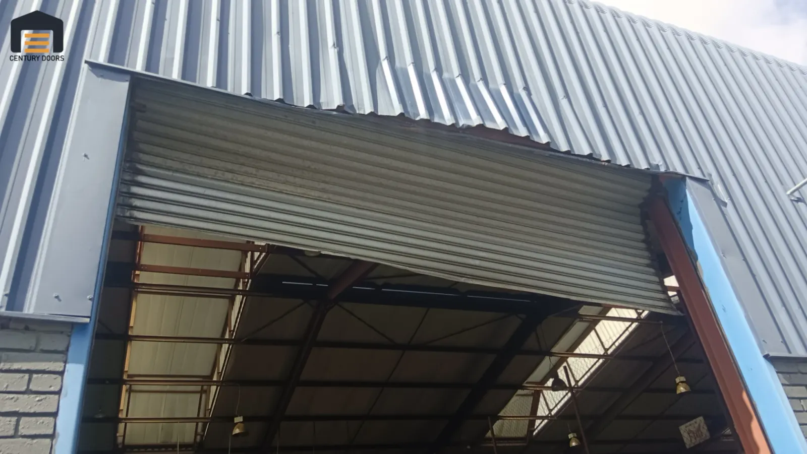 Professional roller shutter door installation on a commercial warehouse in Gauteng