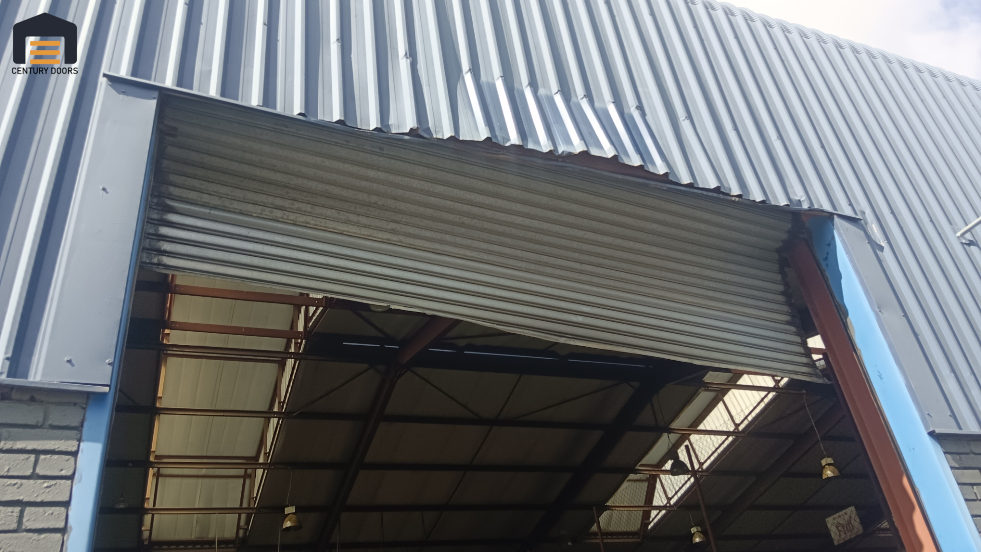 Professional roller shutter door installation on a commercial warehouse in Gauteng